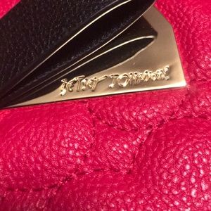 A small Betsey Johnson handbag